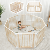 Natural pine wood foldable baby playpen with child-safe latch door on white background