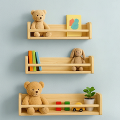 Wooden shelves with toys against a light blue wall