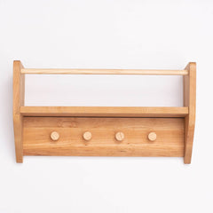 Wooden wall-mounted shelf with four hooks on a white background