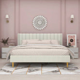 Neatly made bed in a bedroom with pink walls, decorative mirror, and nightstands.