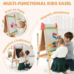 Child creating art on Tiny Land wooden easel showing dual-sided chalkboard and whiteboard