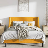 Bedroom with a bed featuring a yellow headboard and gray bedding.