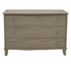 Wooden dresser with three drawers on a white background