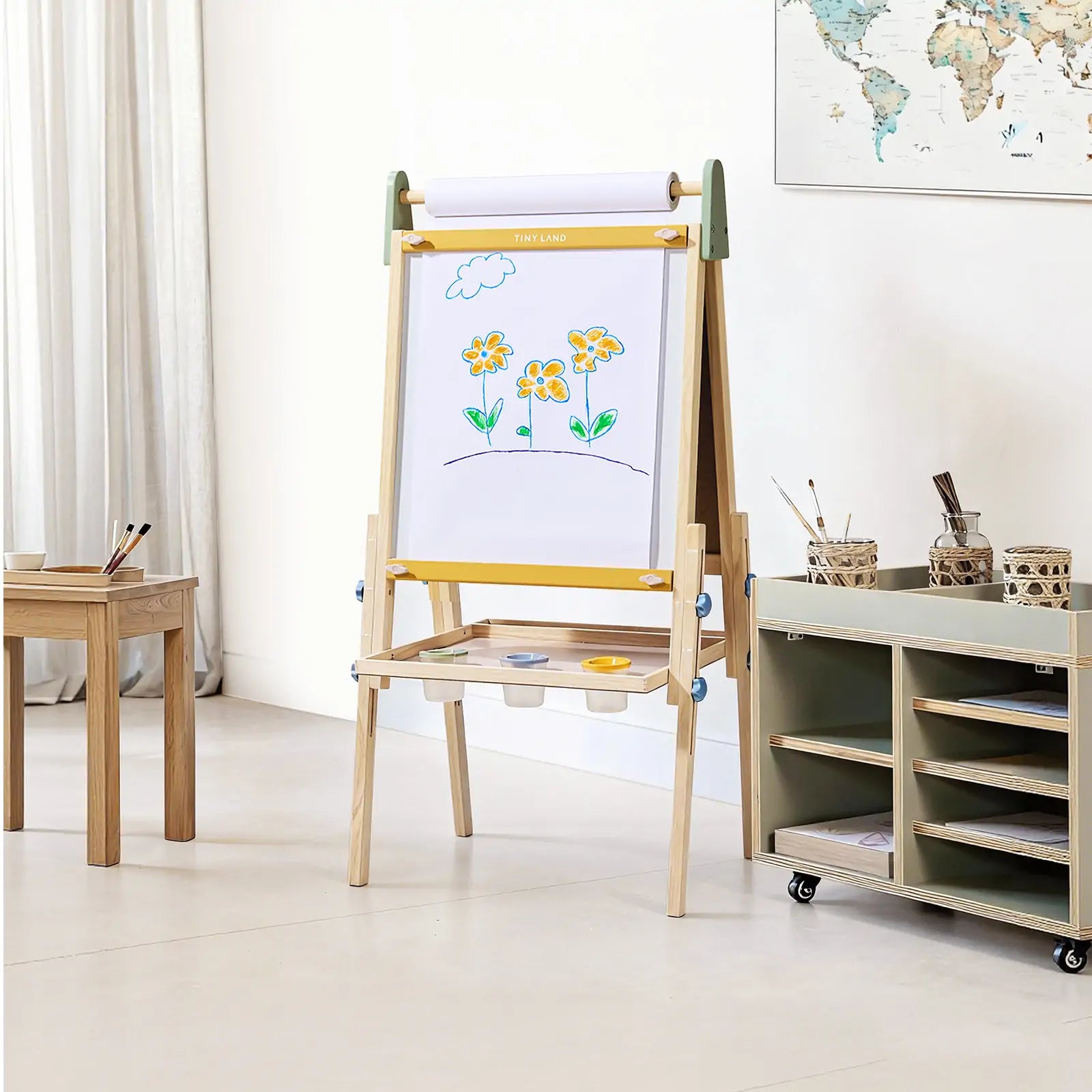 Tiny Land 3-in-1 wooden kids art easel set up in a playroom setting