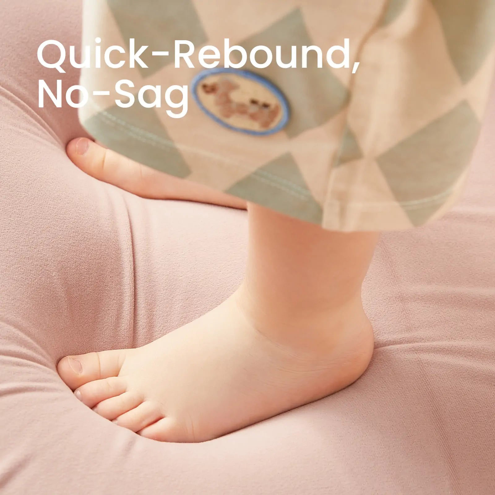 Baby foot with a sock on a pink surface, text 'Quick-Rebound, No-Sag' above.