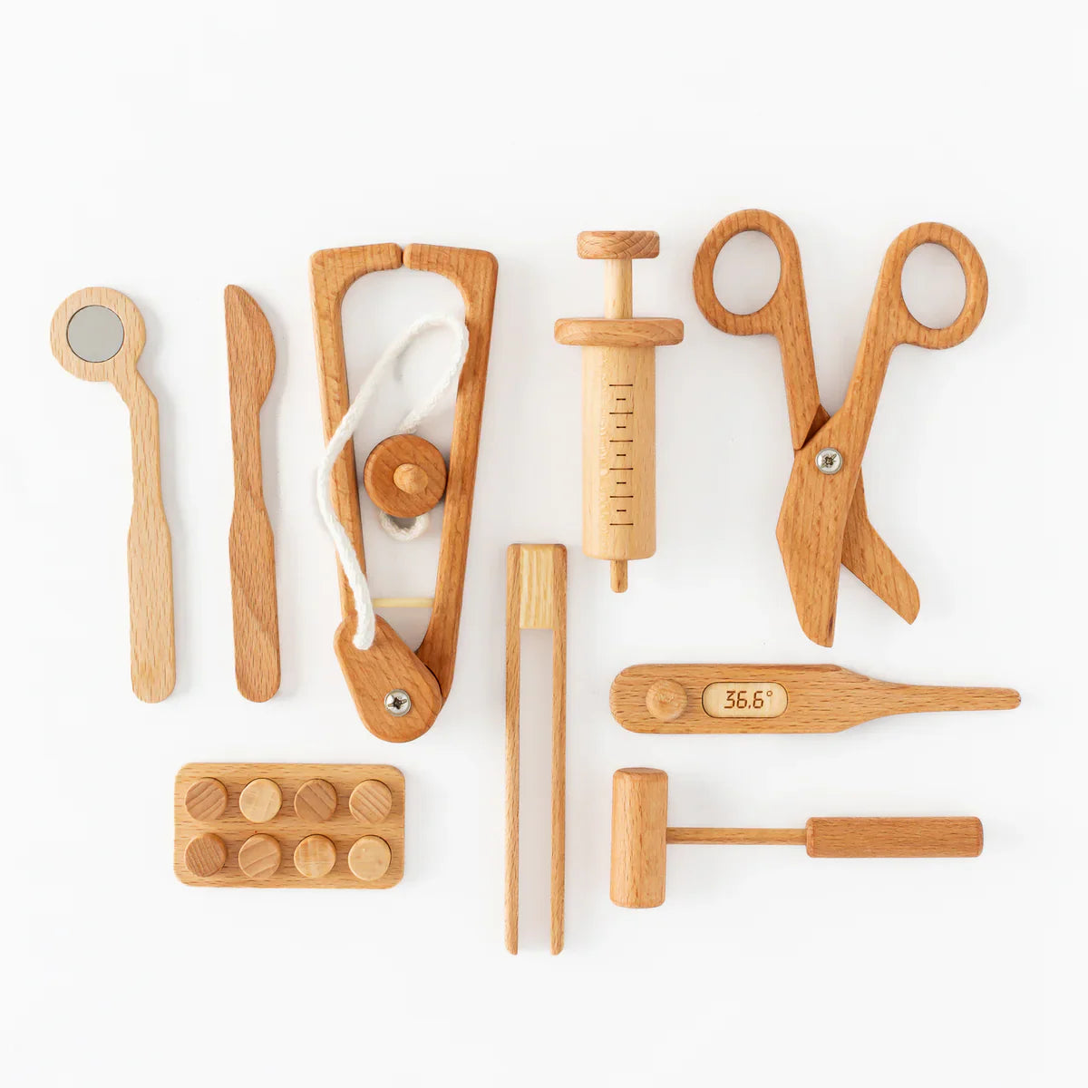 Set of wooden doctor tools on a white background