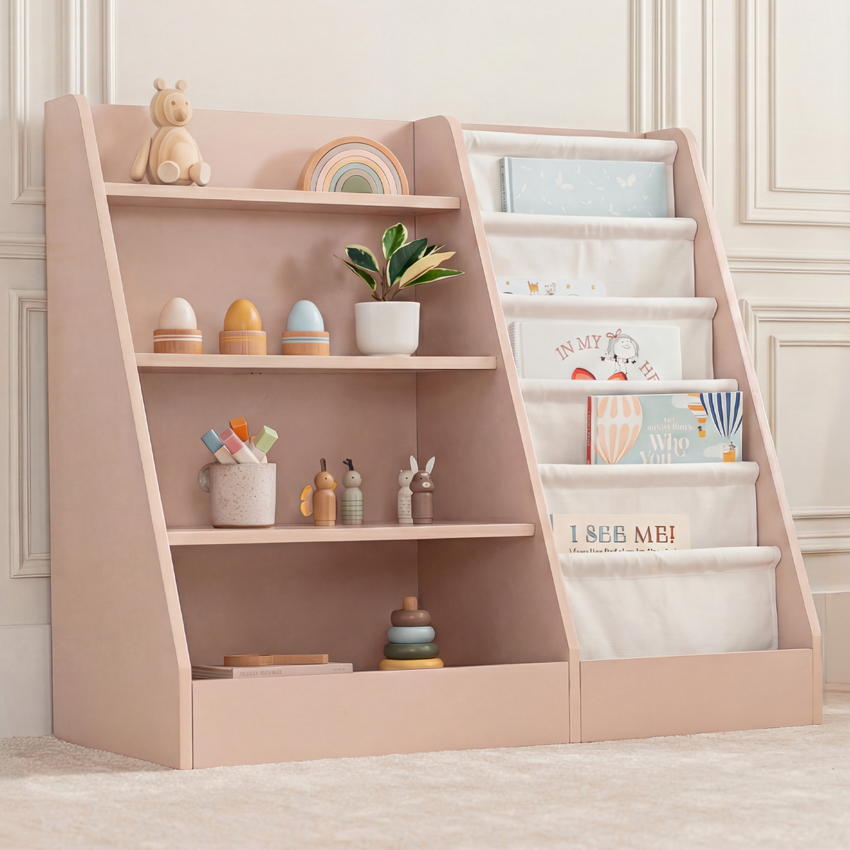 Blush Montessori kids bookshelf with front-facing book display and fabric storage shelves on white background