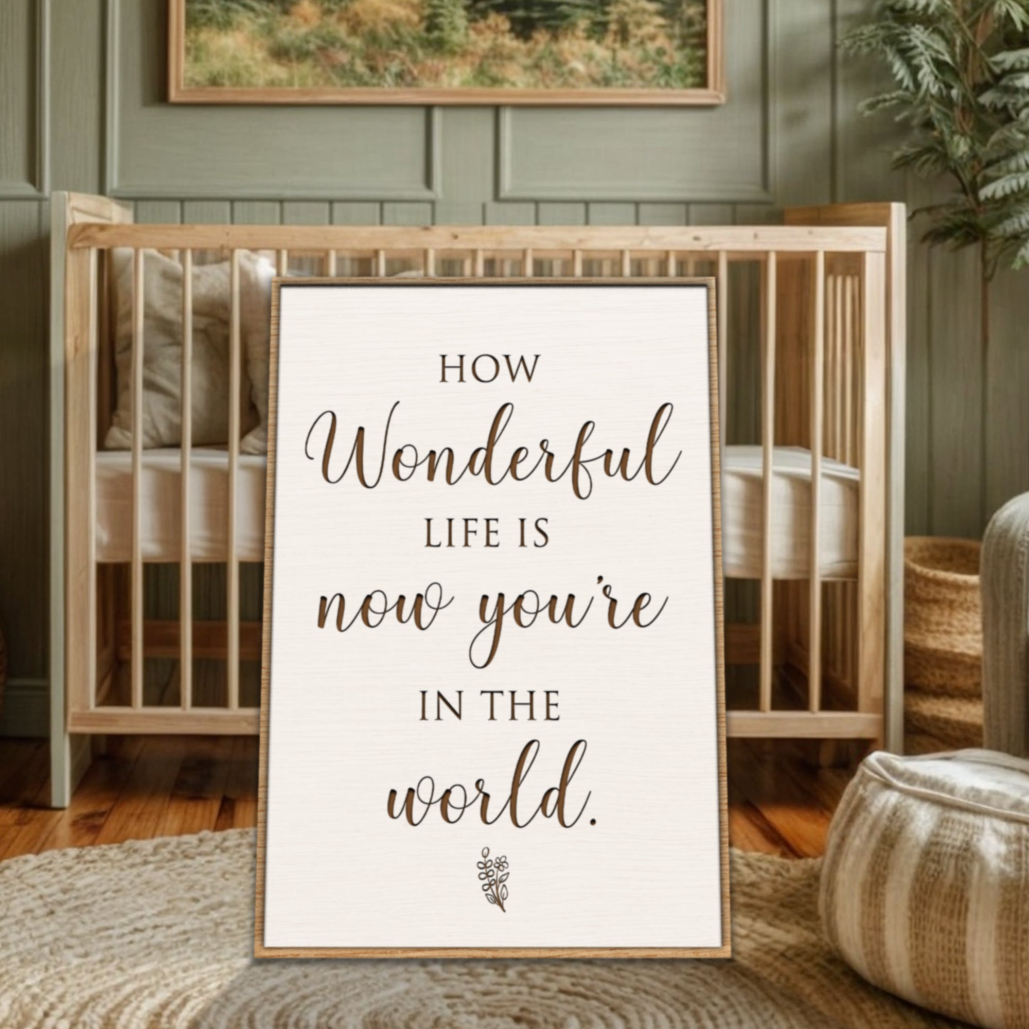 Framed print with 'How wonderful life is now you're in the world' text in a home setting.