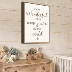 Nursery room with a framed quote on the wall, teddy bear, and crib.