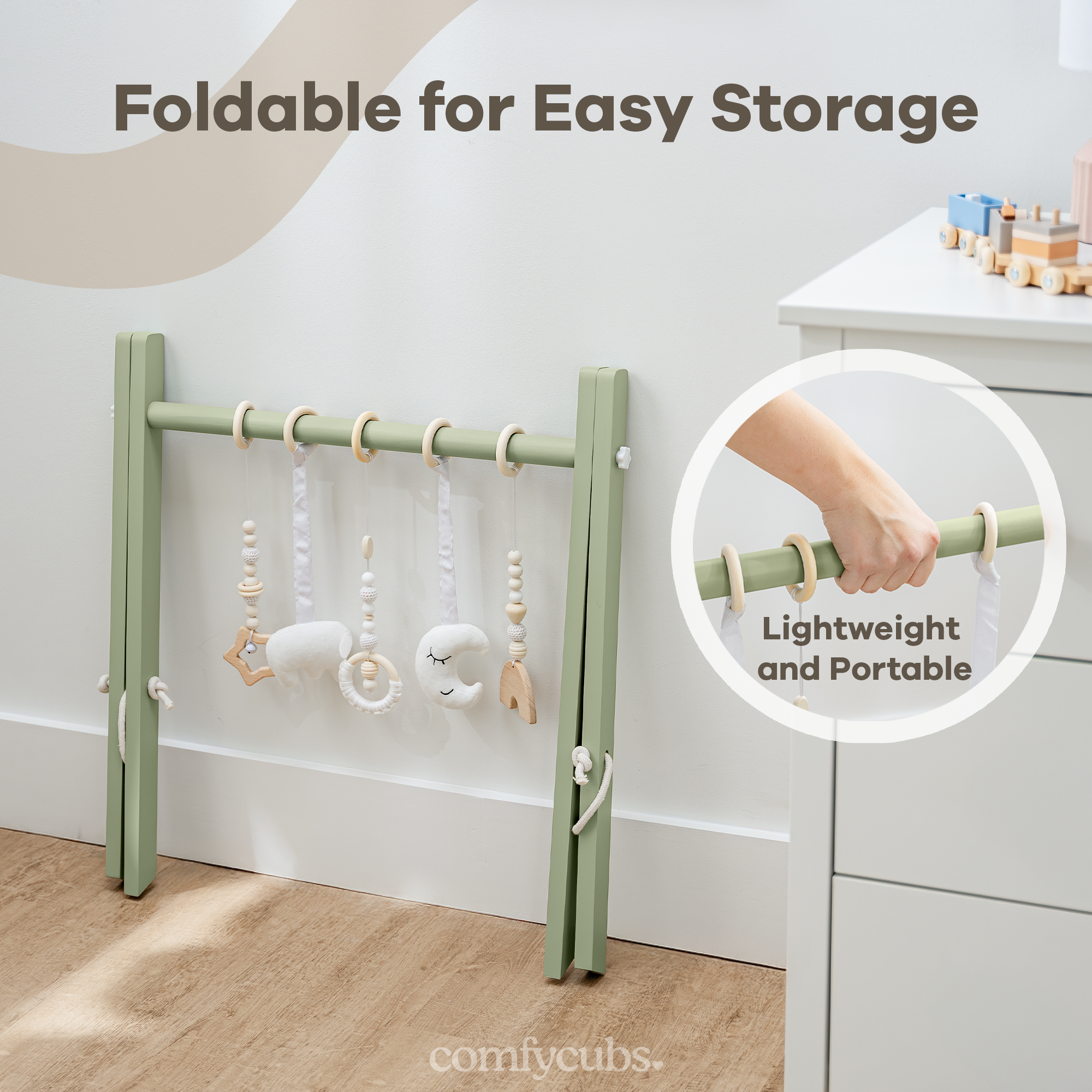 Foldable baby play gym with hanging toys, shown in a room setting.