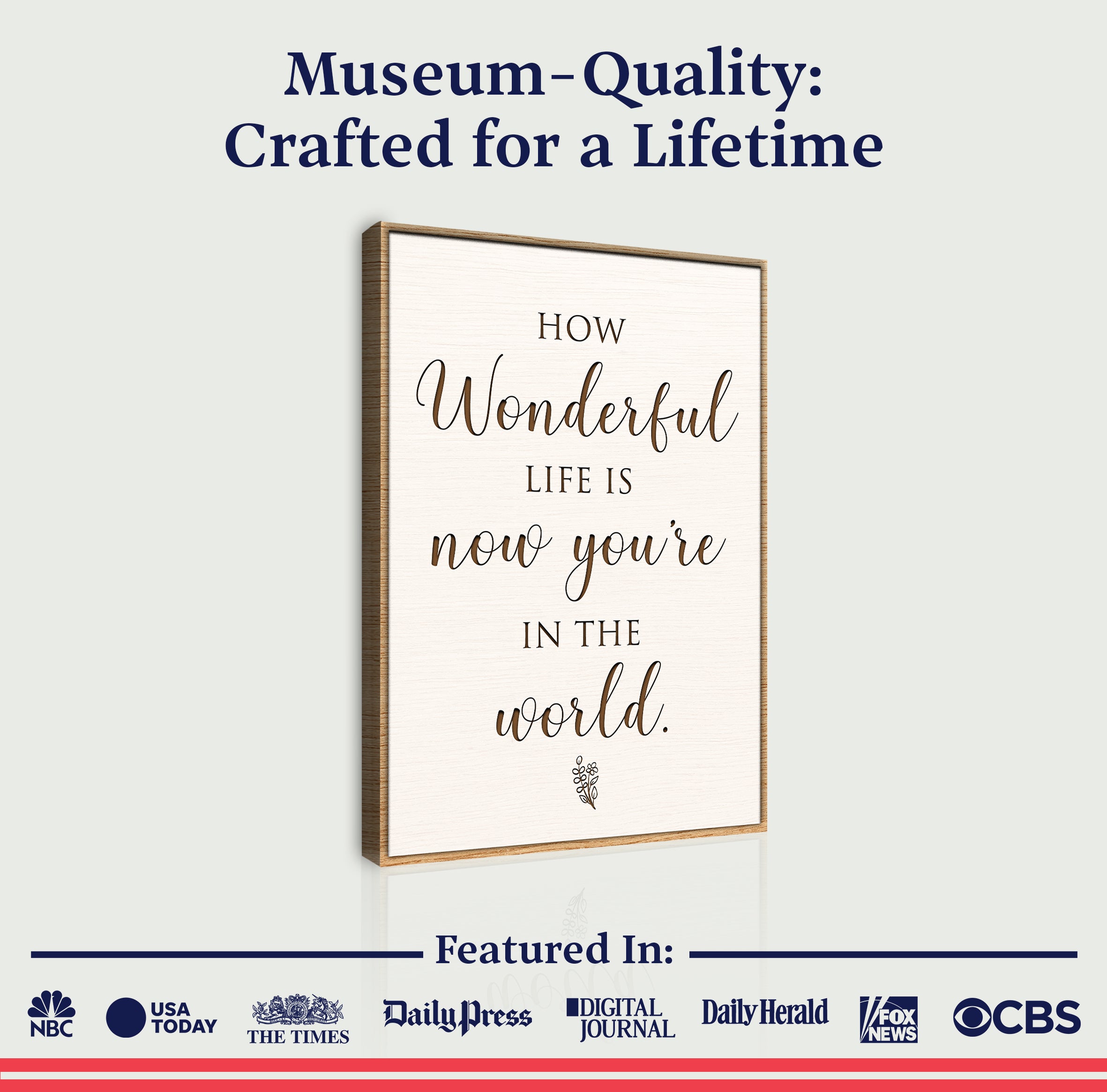 Framed quote on a wall with branding at the bottom