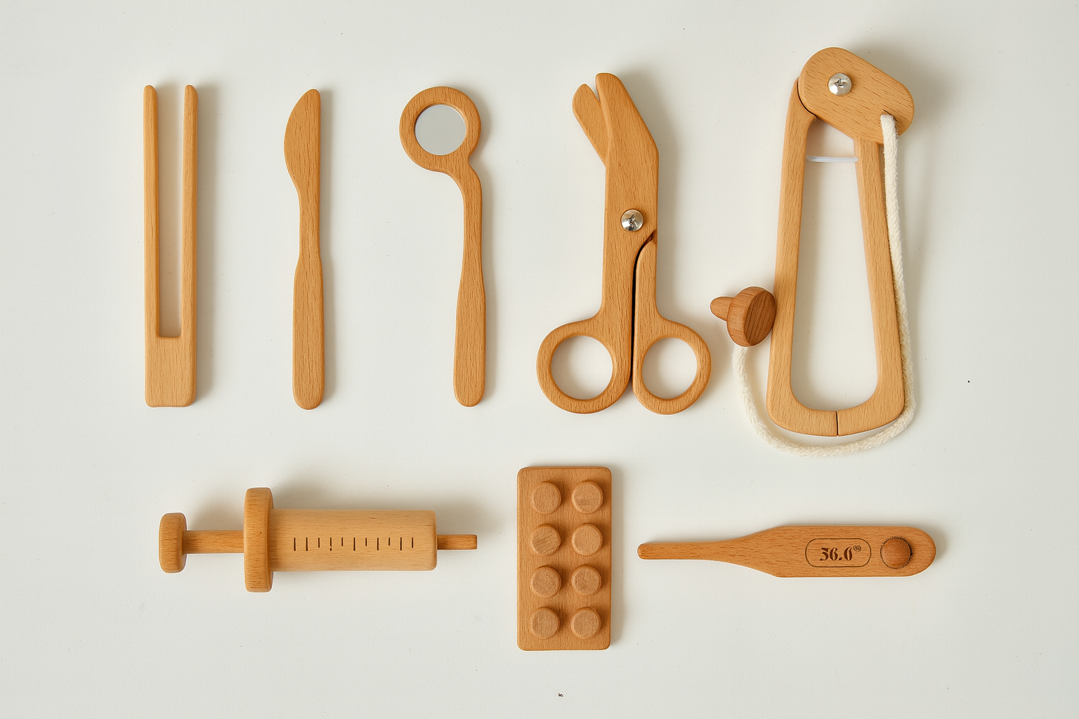 Collection of wooden toys on a white background
