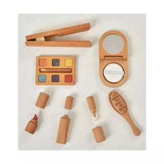 Set of wooden makeup items including a compact mirror, brush, and lip products on a white background