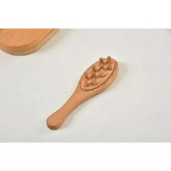 Wooden brush with textured head on a white background