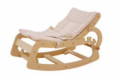 Wooden rocking chair with beige cushion on a white background
