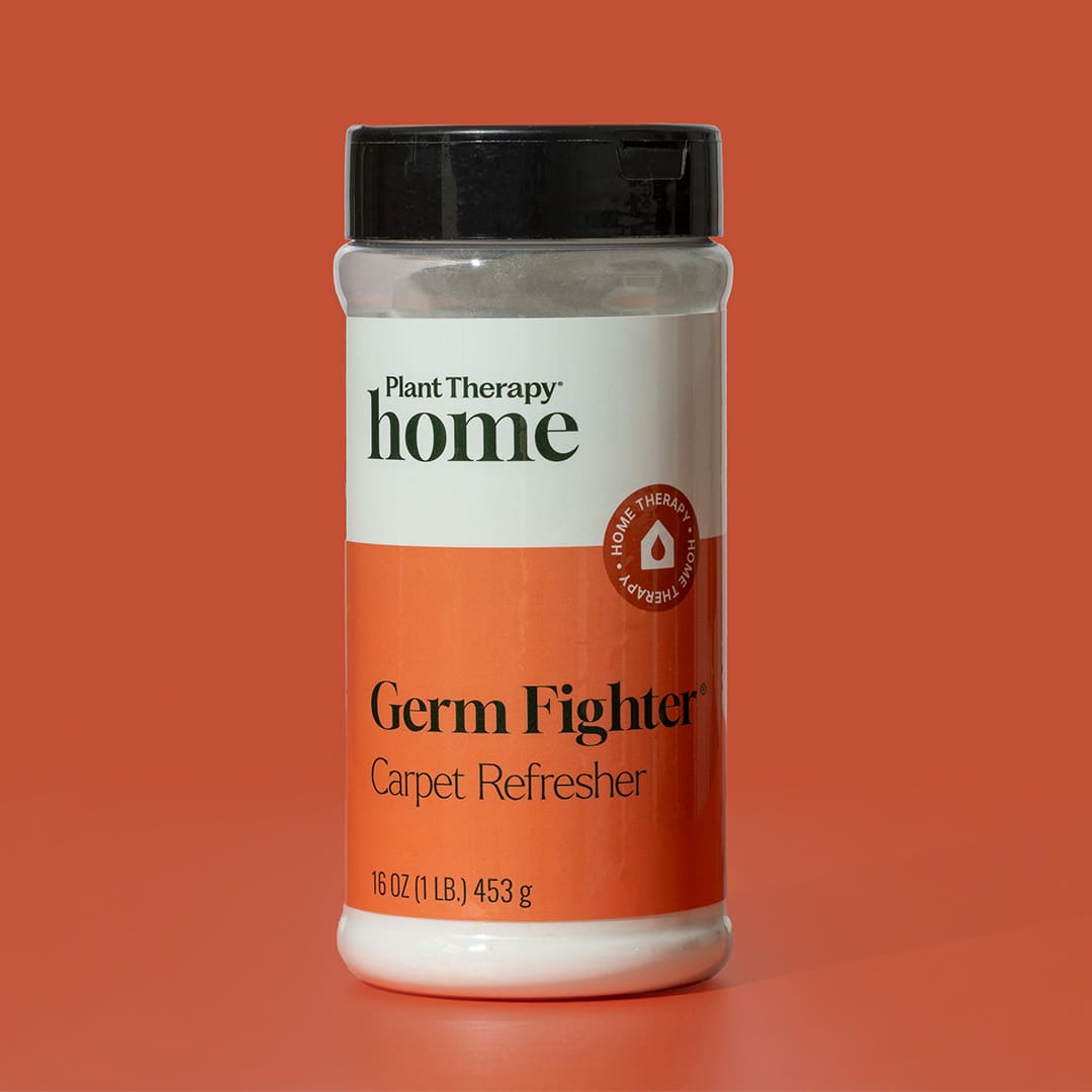 Plant Therapy Germ Fighter Carpet Refresher on an orange background