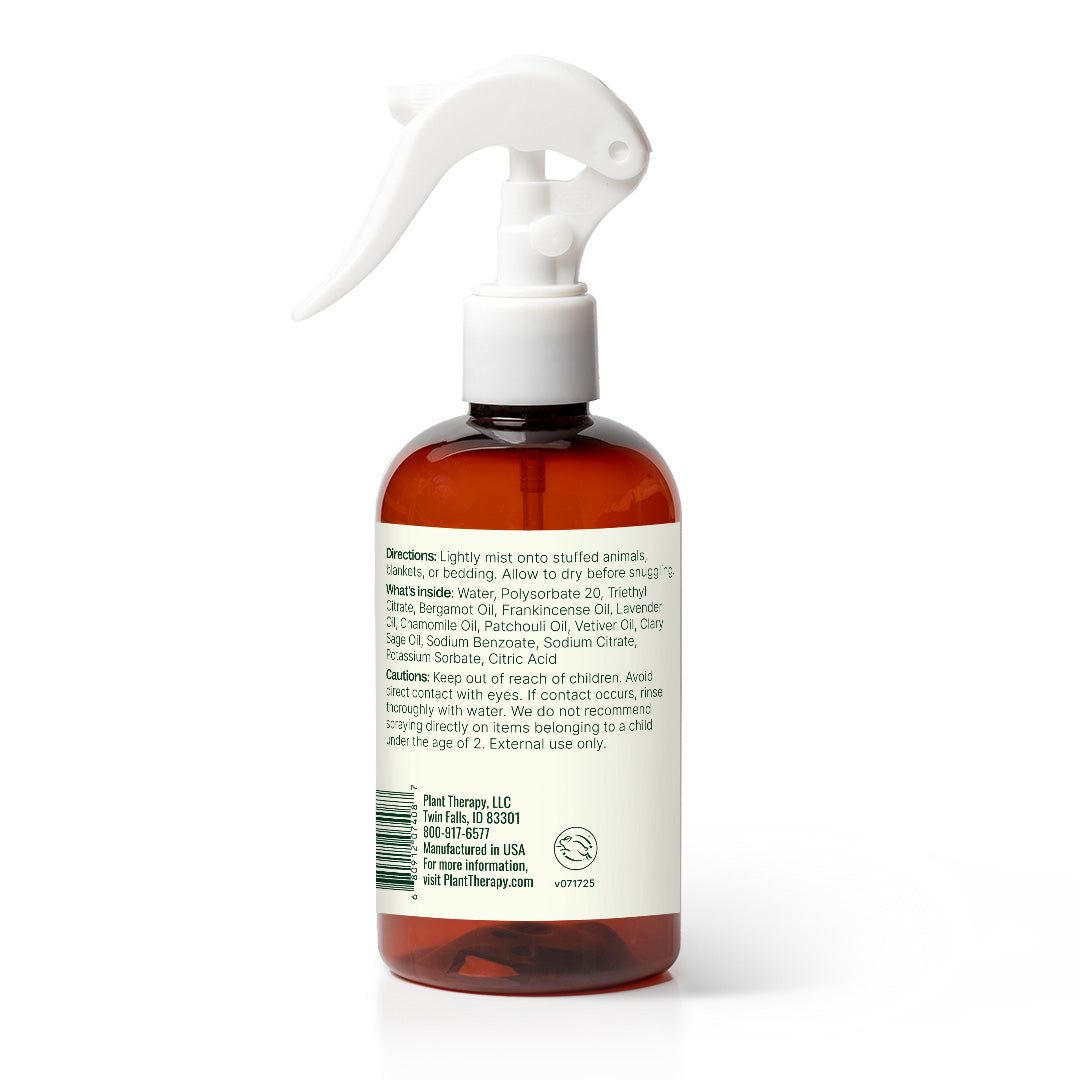 Brown spray bottle with white nozzle on a white background