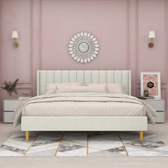 Neatly made bed in a bedroom with pink walls, decorative mirror, and nightstands.