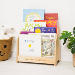 Wooden bookshelf with children's books on a white background