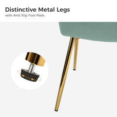 Close-up of a chair with gold metal legs and anti-slip foot pads on a white background.