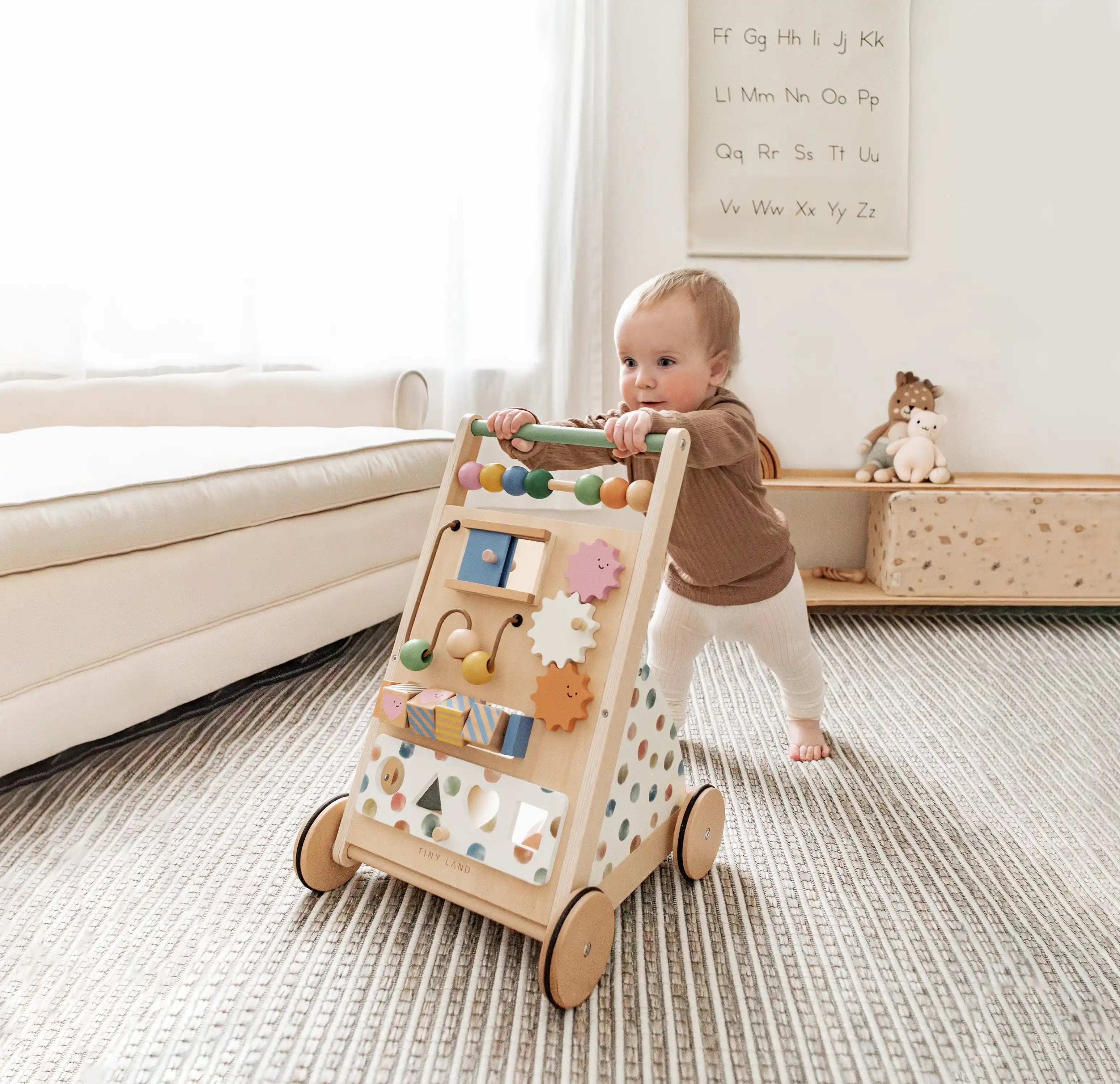 Child pushing activity walker