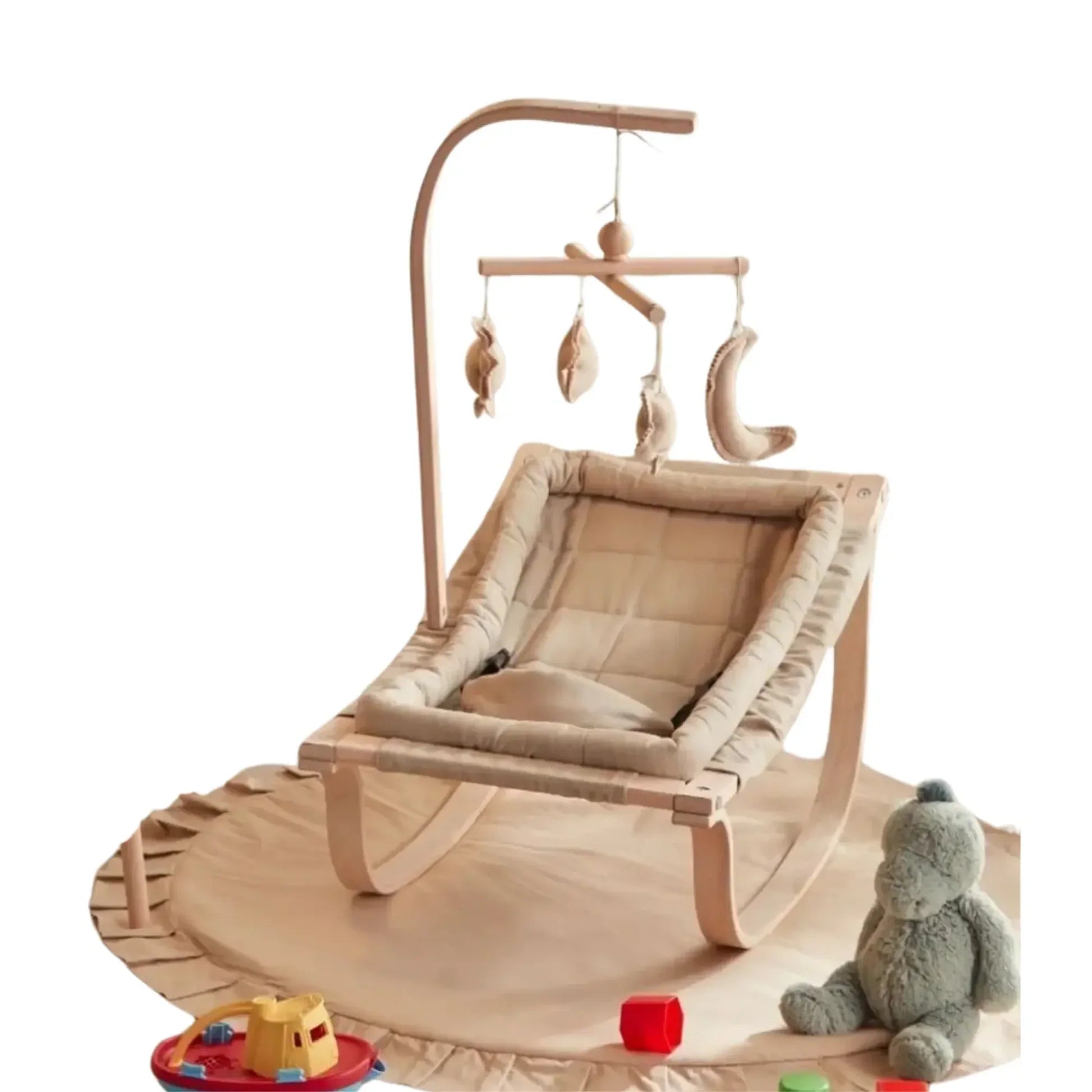 Wooden baby swing with mobile and toys on a white background