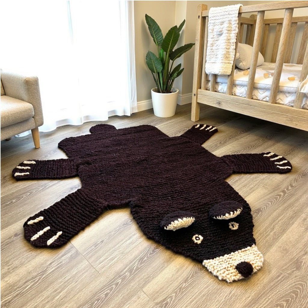 Baby on organic wool brown bear play mat in a calm neutral nursery setting