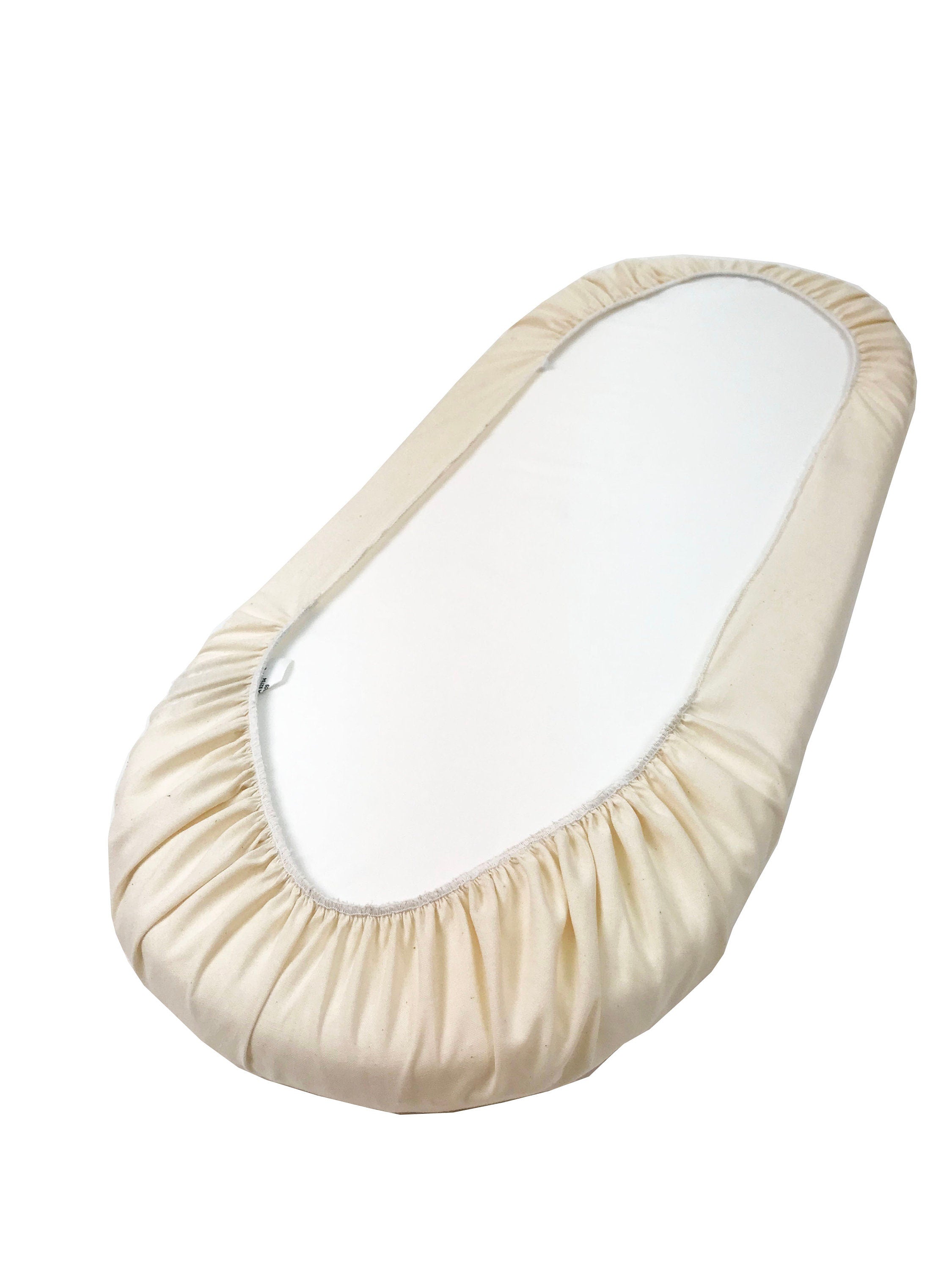 Beige shoe cover on a white background