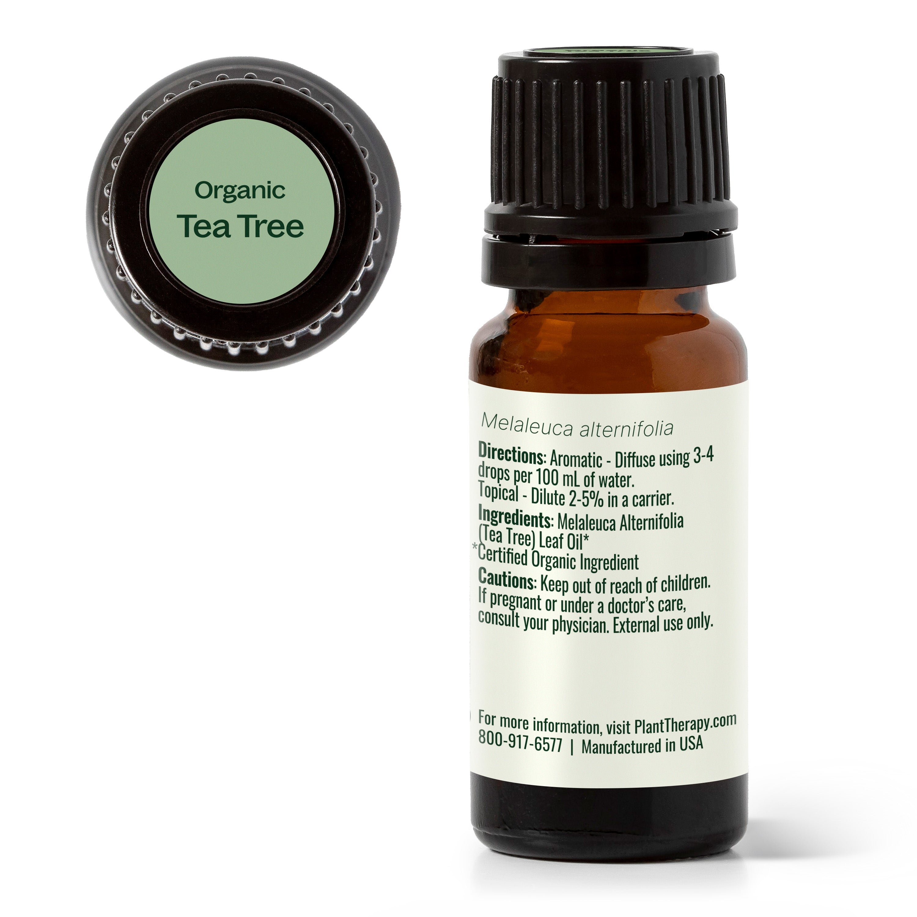 Organic Tea Tree essential oil bottle with label on a white background