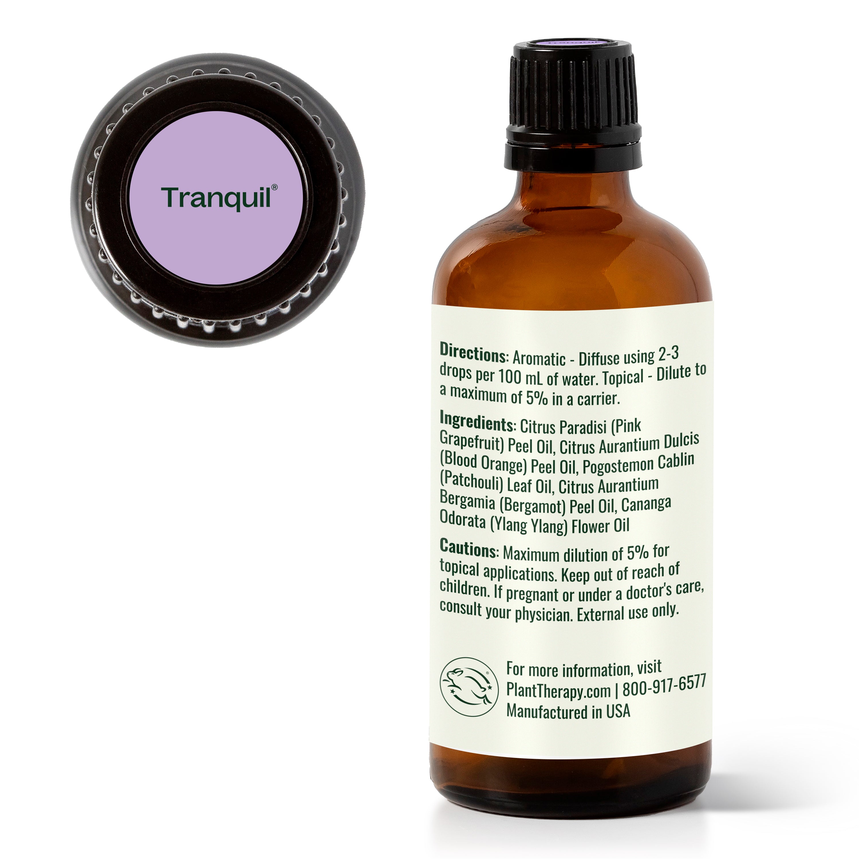Brown glass bottle with black cap labeled 'Tranquil' on a white background