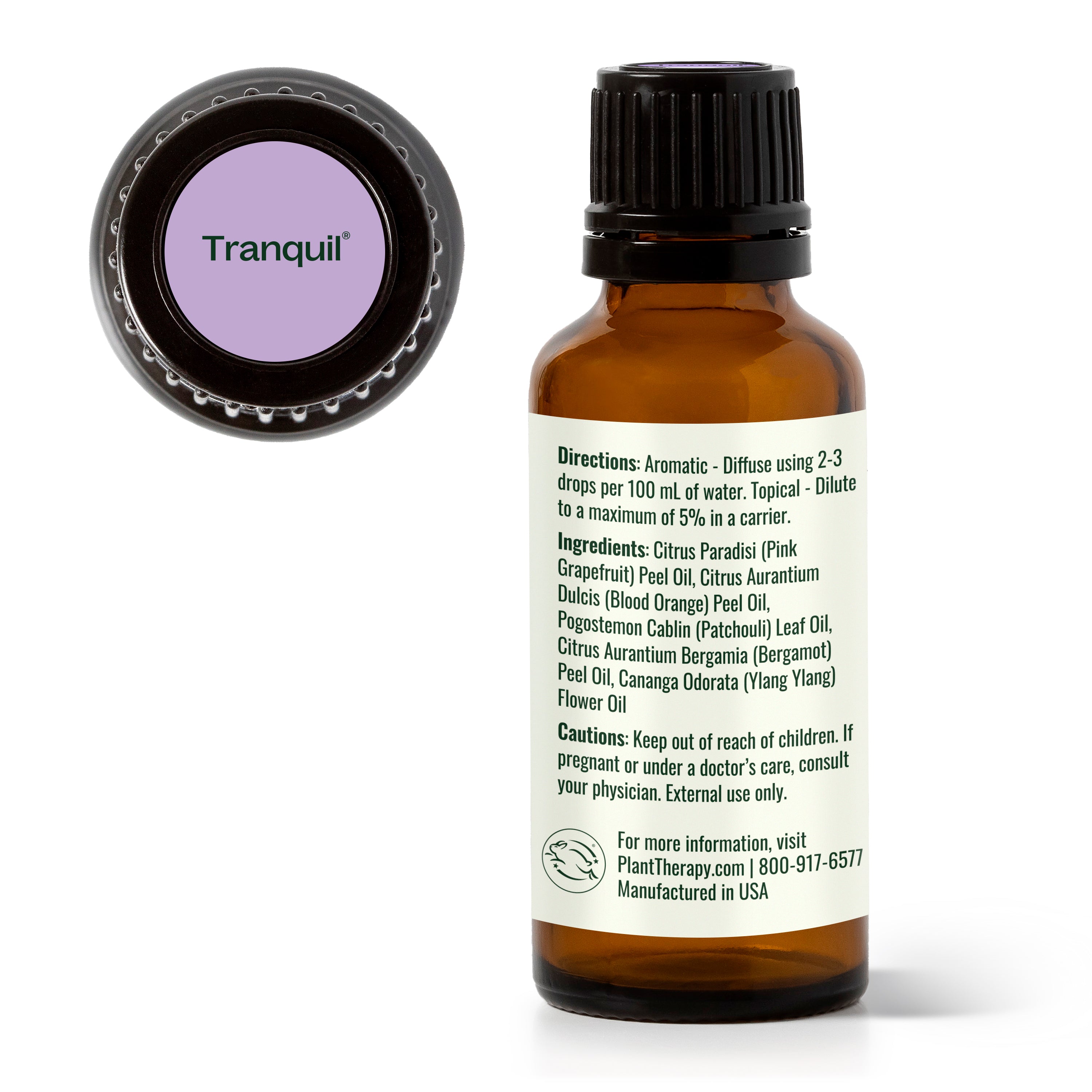 Bottle of essential oil with a 'Tranquil' label on a white background